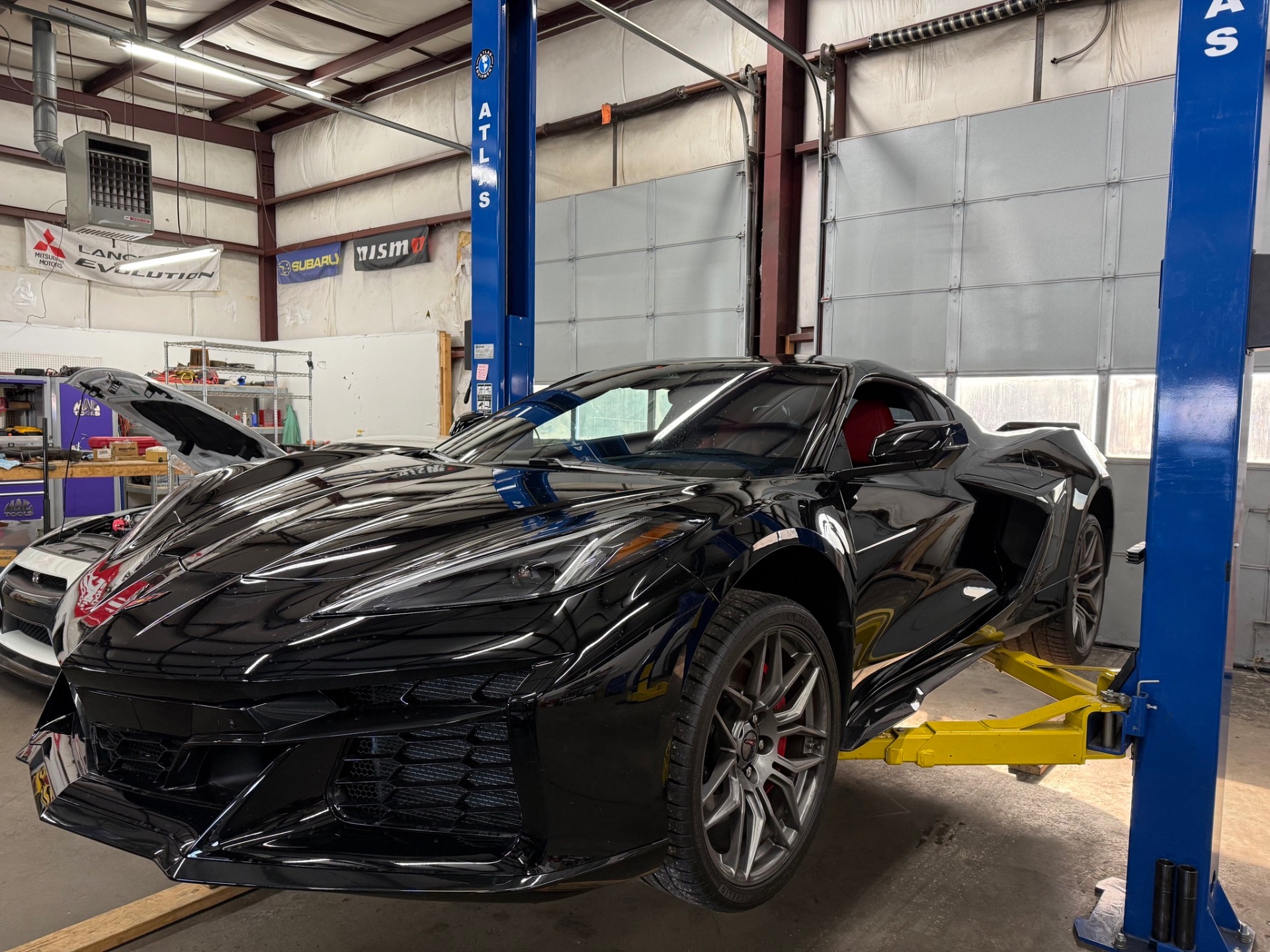 Black Corvette at the shop